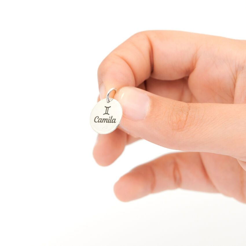 Medalla plata con grabado láser.