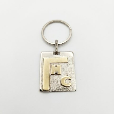 Llavero Alpaca con iniciales en bronce