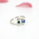 Anillo Cruzado "Tú y Yo" Circonias Verde y Azul - Plata 925